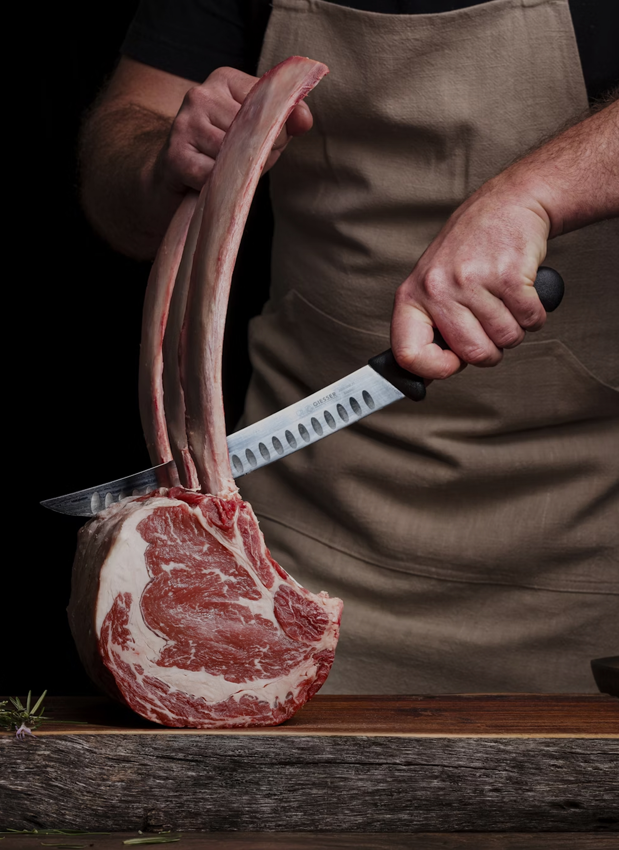 Butcher preparing meat